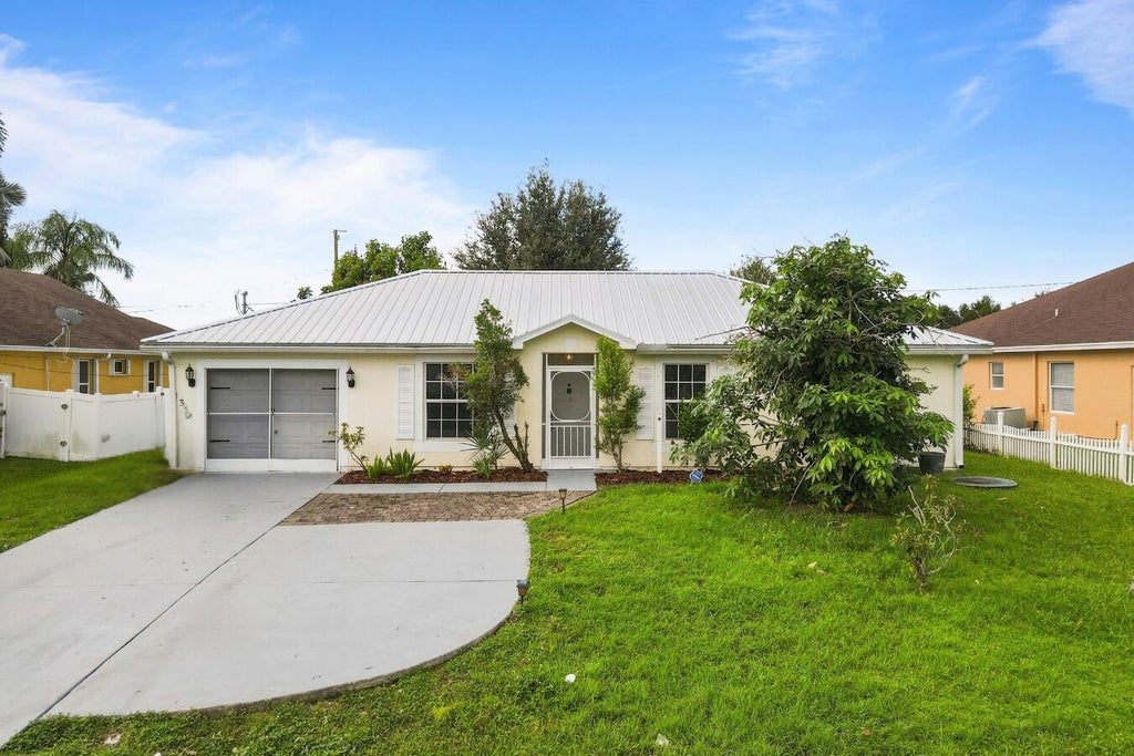 Photo of 1358 SW Prairie Circle, Port Saint Lucie, FL 34953 (MLS # B26080730)