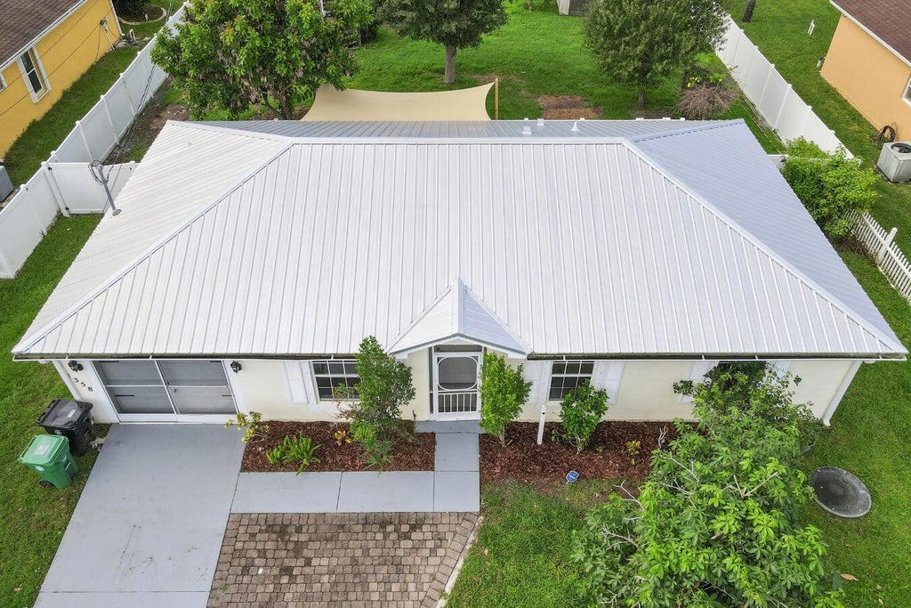 Photo of 1358 SW Prairie Circle, Port Saint Lucie, FL 34953 (MLS # B26080730)