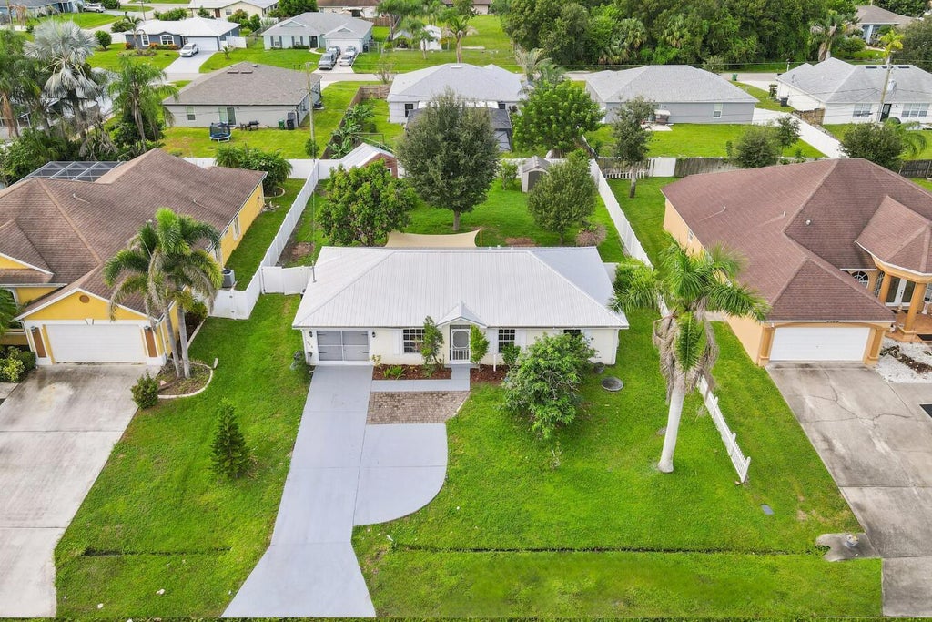 Photo of 1358 SW Prairie Circle, Port Saint Lucie, FL 34953 (MLS # B26080730)