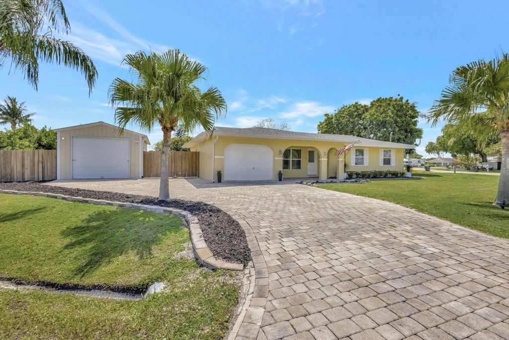 Photo of 691 SE Harbor View Drive, Port Saint Lucie, FL 34953 (MLS # R11082445)