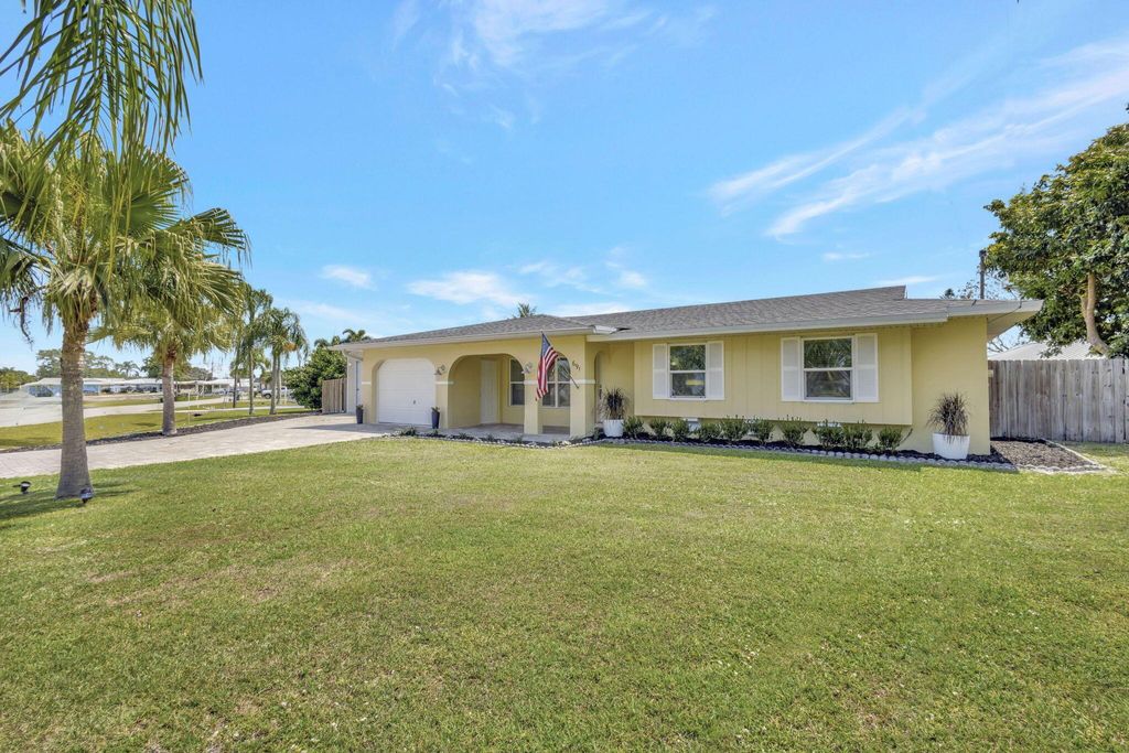 Photo of 691 SE Harbor View Drive, Port Saint Lucie, FL 34953 (MLS # R11082445)
