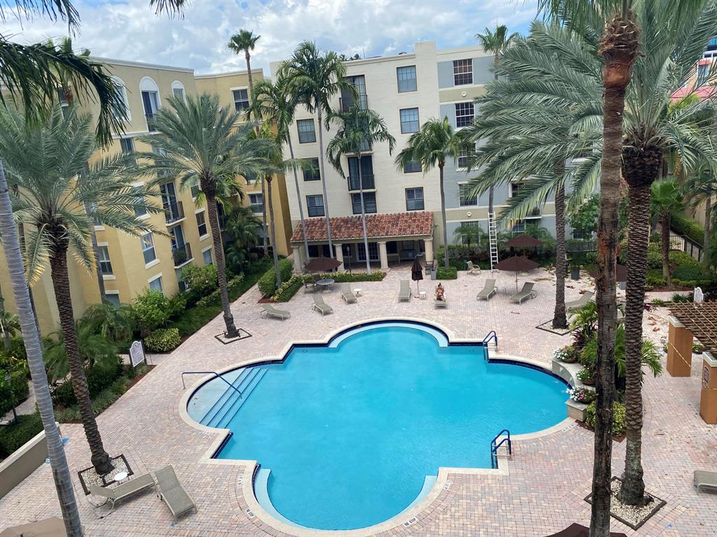 Penthouse Condominium with amazing swimming pool views featuring slate appliances, white kitchen cabinets and granite counter tops. Live in the heart of Downtown West Palm Beach on the top floor of a secure building, no noise from residents walking above. The condo is beautifully decorated with washer and dryer in unit. Courtyards in CityPlace offers resort style amenities which include a clubroom, pool and fitness center. Live/Work/Play location, walk to everything Rosemary Square has to offer, restaurants, shopping, movie theater and Kravis Center for the Performing Arts. Fabulous location, convenient to Palm Beach International Airport, Interstate, golf and beaches. Annual lease only.