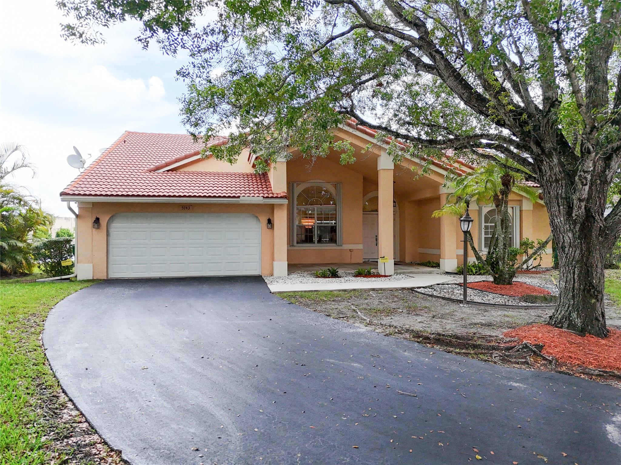 Welcome to Westview Village, an exclusive community of only 83 homes, zoned for A+ schools. This spacious 4-bedroom, 2-bathroom home features a desirable split floor plan and is perfectly situated on a quiet 15,609 sqft cul-de-sac corner lot with water views. Enjoy peace of mind with a 2023 A/C system, impact-rated garage door, and a combination of accordion and panel shutters throughout. The updated master bathroom and kitchen are ideal for both everyday living and entertaining. No HOA approval required. Don’t miss this unique opportunity to own a well-maintained home in a highly sought-after location!