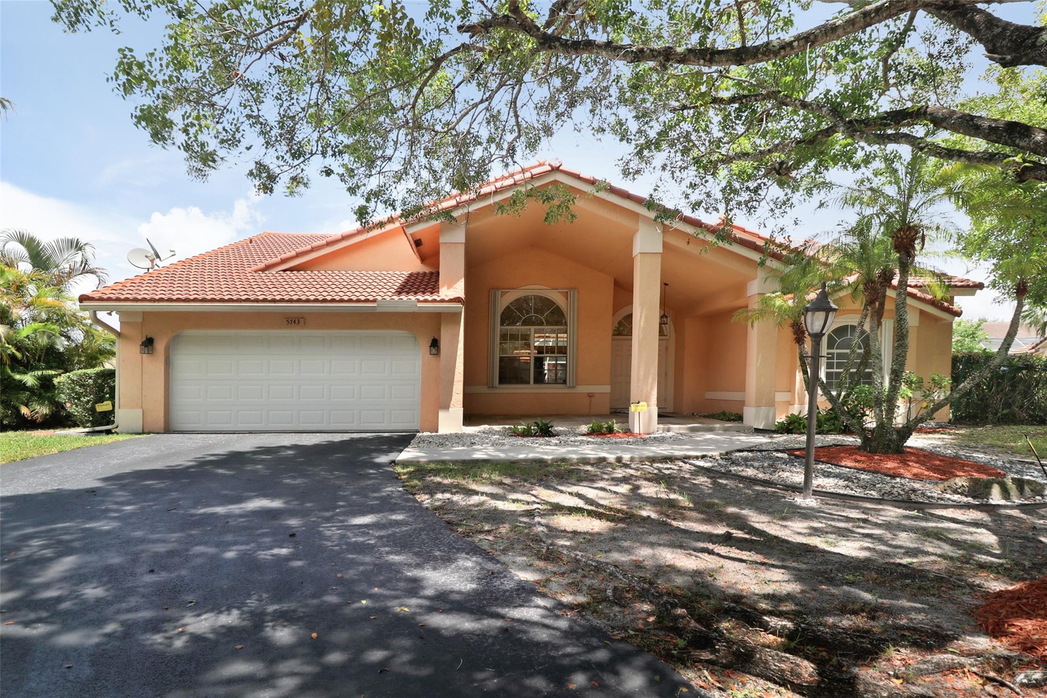 Welcome to Westview Village, an exclusive community of only 83 homes, zoned for A+ schools. This spacious 4-bedroom, 2-bathroom home features a desirable split floor plan and is perfectly situated on a quiet 15,609 sqft cul-de-sac corner lot with water views. Enjoy peace of mind with a 2023 A/C system, impact-rated garage door, and a combination of accordion and panel shutters throughout. The updated master bathroom and kitchen are ideal for both everyday living and entertaining. No HOA approval required. Don’t miss this unique opportunity to own a well-maintained home in a highly sought-after location!