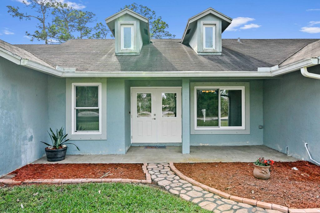 Photo of 16526 Hamlin Boulevard, Loxahatchee, FL 33470 (MLS # R10947191)