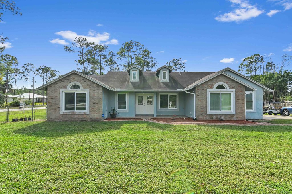 Photo of 16526 Hamlin Boulevard, Loxahatchee, FL 33470 (MLS # R10947191)