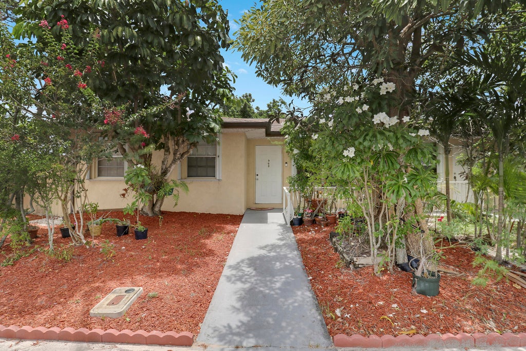 Photo of 968 Sumter Road W, West Palm Beach, FL 33415 (MLS # R11102469)