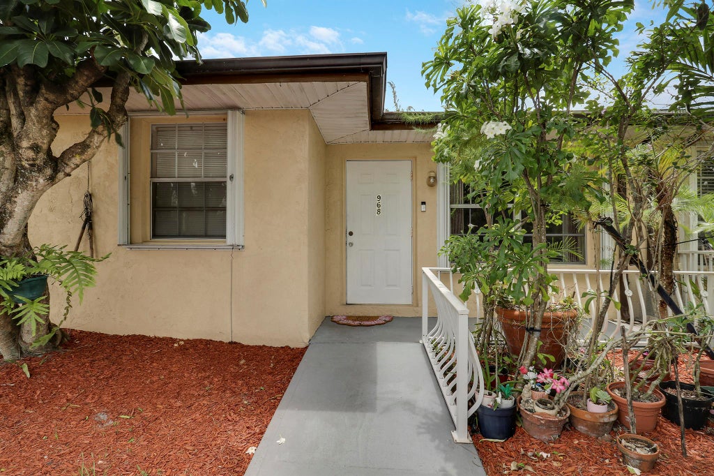 Photo of 968 Sumter Road W, West Palm Beach, FL 33415 (MLS # R11102469)