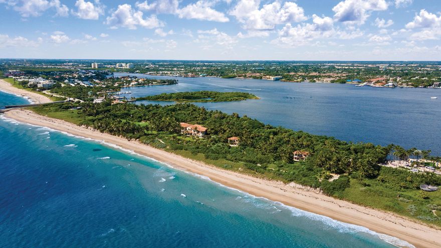 This 15-acre ocean-to-lake estate stands alone in all of the Palm Beaches for its beauty, privacy, amenities and sheer scale. Offering a remarkable combination of 1,200± feet of dune-lined beach on the Atlantic with 1,300± feet of frontage on Lake Worth, 2000 South Ocean Boulevard is unrivaled among South Florida's most significant waterfront properties. Perched atop a dune, with 360-degree views, it is the only direct oceanfront home for almost a mile, yet just minutes from Worth Avenue. Like many estates in the area, the property is divided by South Ocean Boulevard, yet the road is essentially imperceptible thanks to a series of tunnels including one that is a furnished 15-foot-wide gallery. See supplemental text... A true family compound, the estate offers a 12-bedroom main residence; two four-bedroom beachside cottages; the seven-bedroom Mango House; and a guest or staff house comprising four studios and apartments. In total there are more than 30 bedrooms, a series of formal and informal living and dining areas, a media room, libraries, offices, numerous terraces, an expansive wine cellar and two elevators. The centerpiece main residence offers 62,200 Â± square feet with both ocean and lake views. Gemini offers an array of recreational amenities, including a swimming pool, PGA standard golf area, regulation tennis court, half basketball court, fitness center and spa. Pathways lead to the beach on the ocean as well as to a dock and pier on the lake for boating and water sports. The proximity of the Gulf Stream affords Gemini a singular microclimate, with refreshing breezes and warmer waters, even when cooler weather prevails in Miami, 65 miles to the south. These unique conditions allowed for the creation of extensive botanical gardens that showcase nearly 1,500 tropical species that replicate a "walk through the Caribbean." The offering of this exclusive enclave affords a once in a generation opportunity to acquire a family compound that simply cannot be replicated.