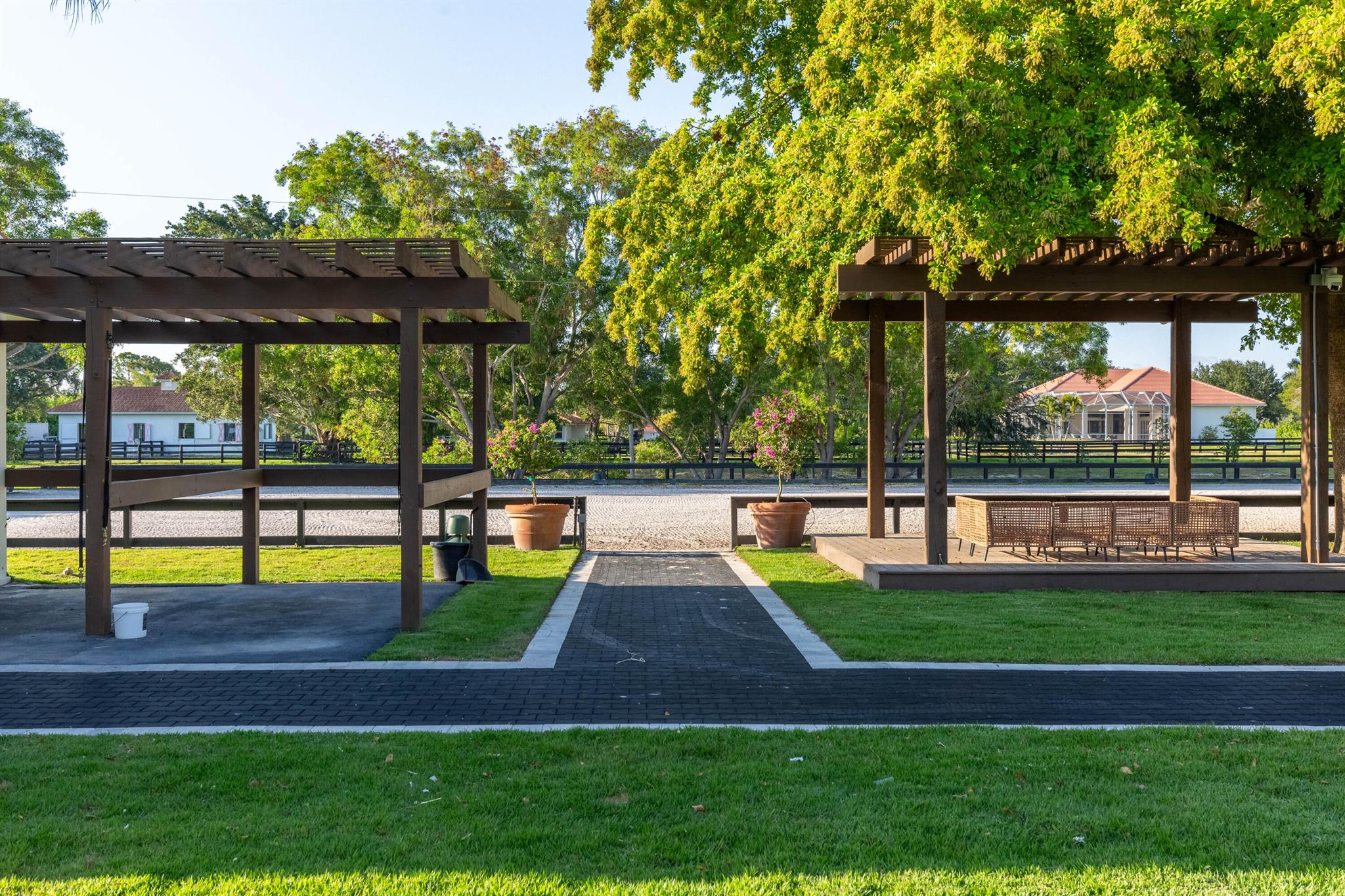 Renovated equestrian farm available for the 2026 season!Price is per stall for a 5 month season but owner would be open to a different duration.The main residence and staff housing is also available to rent.Equestrian amenities are thoughtfully designed and meticulously maintained. The main barn features 7 spacious stalls, while a secondary barn offers 2 additional stalls. Additional highlights include high-powered fans, an air-conditioned tack room, a professional fly spray system, and two covered wash racks. On-site staff accommodations include a separate 2-bedroom residence, ensuring comfort and convenience for your team.This private, 4-bedroom, 3-bathroom residence offers a serene escape, complete with a heated pool--ideal for unwinding after a day at the show-grounds.