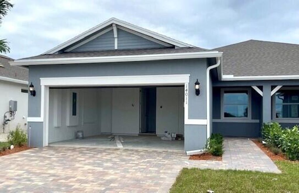 Photo of 14011 SW Gingerline Drive, Port Saint Lucie, FL 34987 (MLS # R11023222)