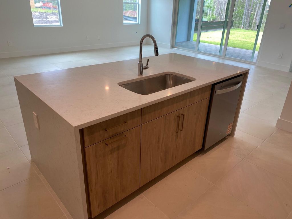 Photo of 6880 SE Park Trace Drive, Stuart, FL 34997 (MLS # R11106378)