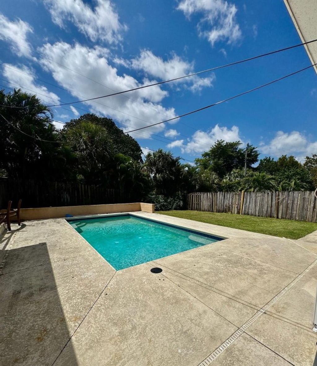 Photo of 1528 NE Sunview Terrace, Jensen Beach, FL 34957 (MLS # F10496612)