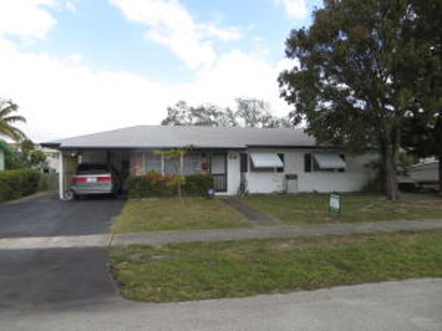 Beautiful home! Well maintained, A/C & Roof are Newer. Huge backyard! Concrete slab next to the carport is large enough for a boat. House is move in condition.