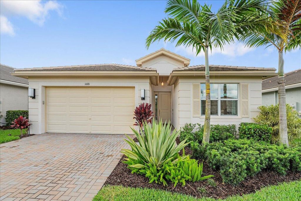 Photo of 11681 SW Oceanus Boulevard, Port Saint Lucie, FL 34987 (MLS # R11102887)