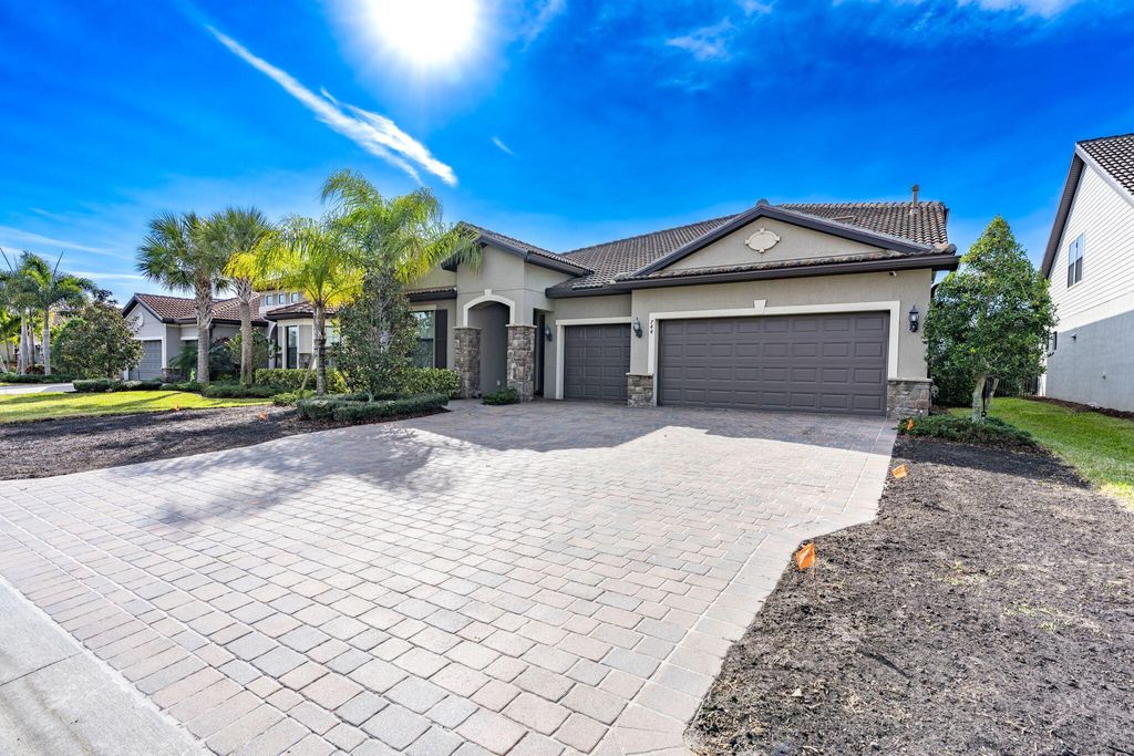 Photo of 744 SE Villandry Way, Port Saint Lucie, FL 34983 (MLS # R11163349)