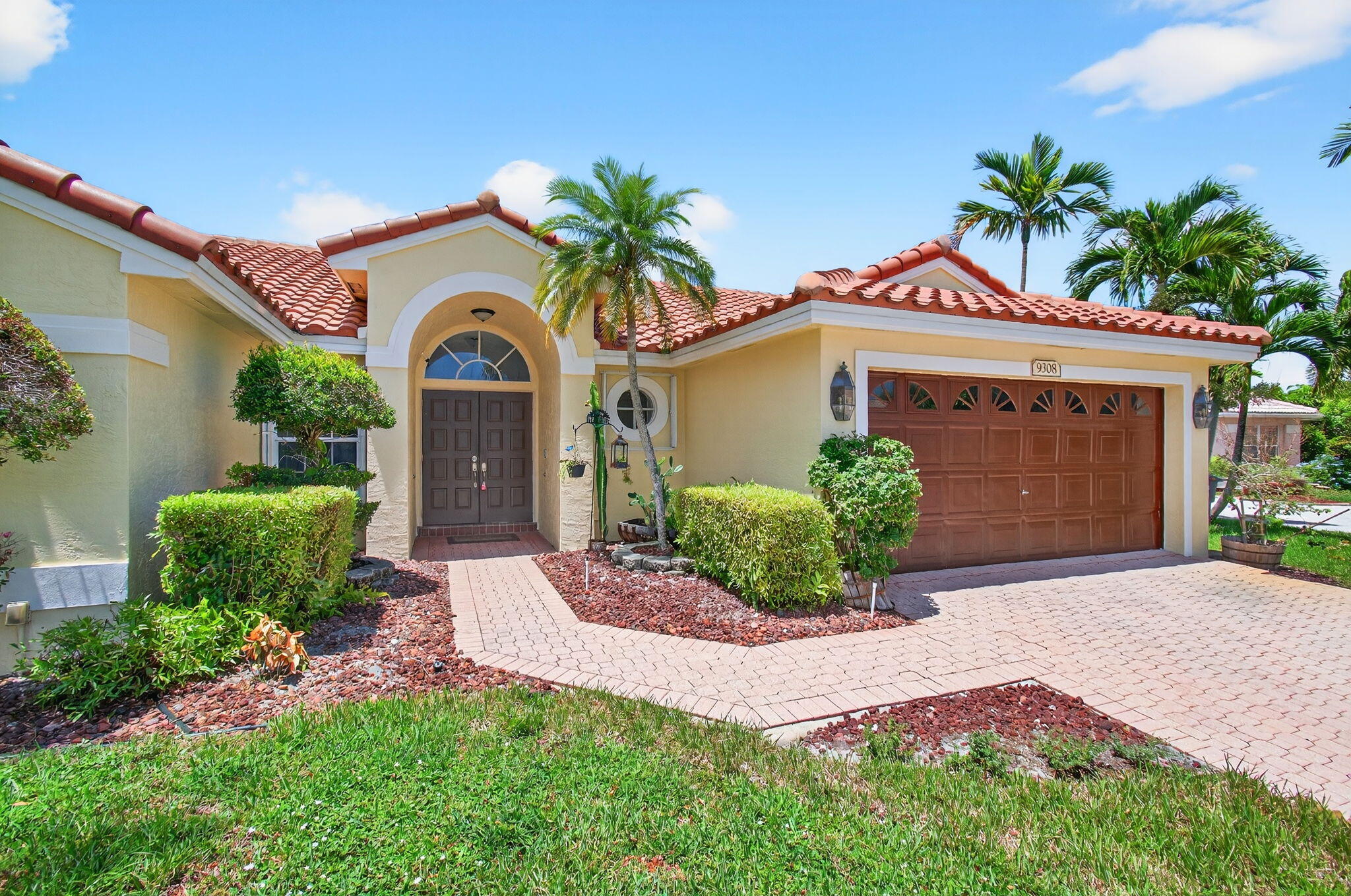 Beautiful 4 bed, 2 bth home located in Boca Vista Estates zoned in an ''A-Rated school district. This home offers an abundance of natural lighting and tile and laminate flooring throughout. The floor plan is open and inviting, perfect for entertaining, with direct access to a covered, screened-in patio right off the kitchen. The backyard includes a firepit and a large grass area, and is just steps away from the community playground. The home has a brand new roof and has been freshly painted inside and out. The community is less than a mile walk to Doris Italian Market, various restaurants, and ice cream shops. Within a short walking distance, you can also enjoy the community's private tennis, basketball & racquetball courts, and a large resort-style pool. Call now for a tour!