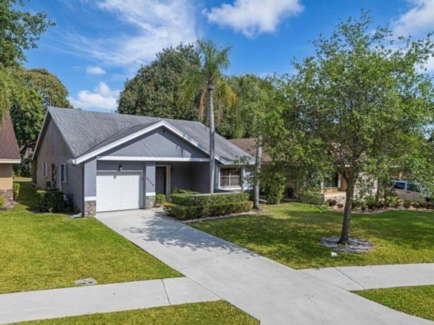 Priced to sell quickly*55+ COMMUNITY* TAMARIND VILLAGE* TOWNSHIP*LOW MAINTENANCE*2 BEDS 2 BATHS*Glass enclosed Florida room is entire width of home, Beautifully tiled to be a bonus room of your choice*Entire home is tiled on a diagonal /45 degree angle bringing elegance as well as classic features including Sky high vaulted ceilings & a Foyer*One Car Garage w/ Impact door*Driveway fits 2 cars*Large galley Kitchen & Eat in breakfast Area, while original in style, has been maintained*Care shows throughout home*Move right in or adjust cosmetically to your style*Stainless Steel French door Fridge*ACCORDION SHUTTERS*Garden view through Bay window in Dining Room* Dedicated Laundry room w/ Washer/dryer & cabinet storage*NO RENTING*2 Pets ok*Township amenities, ask us, too many to list*