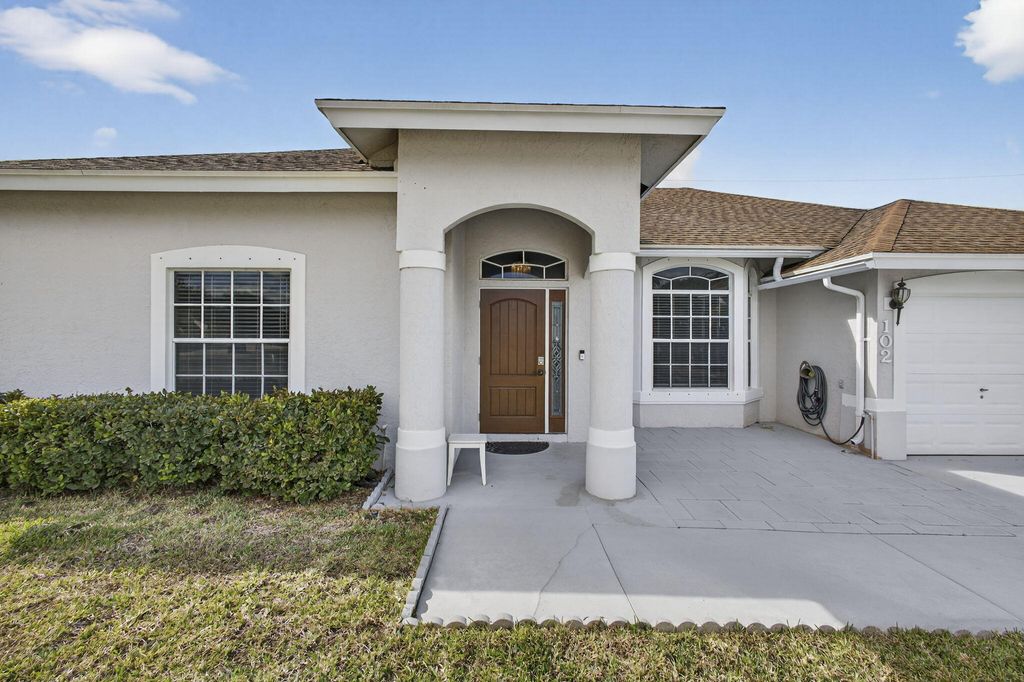 Photo of 102 Brook Woode Court, Royal Palm Beach, FL 33411 (MLS # R11164048)