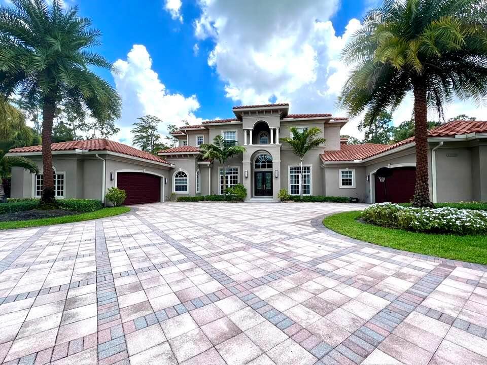 This is an amazing home, for an amazing price!! Stunning modern smart home with over an acre of totally fenced land, heated salt water pool, summer kitchen, impact glass, soaring ceilings, upgraded appliances, 4 car garage, a 10 person movie theater, generator,gas stove with 1000 gallon propane tank, two large master suites, one on the ground Floor and one upstairs, huge gated driveway, whole house speakers,outdoor audio, the list goes on and on. DO NOT MISS this opportunity , just 10 mins from a major airport, 25 mins to the ocean and Palm Beach , 7 mins to all the Equestrian and POLO activities. More pictures to come!!.