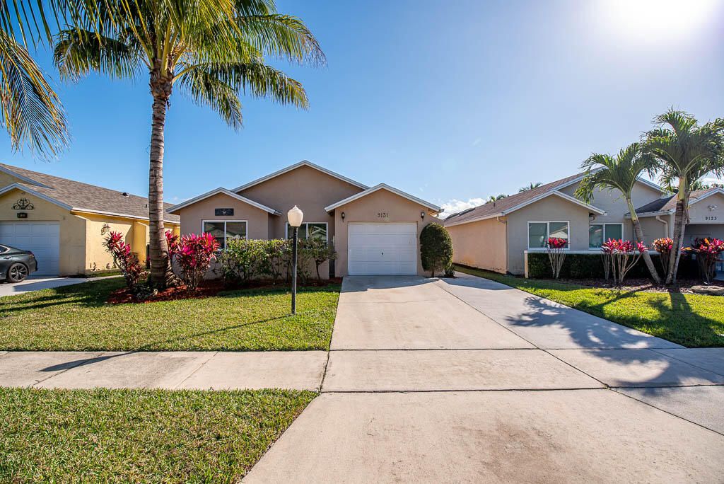 Photo of 9131 Pine Springs Drive, Boca Raton, FL 33428 (MLS # R11056169)