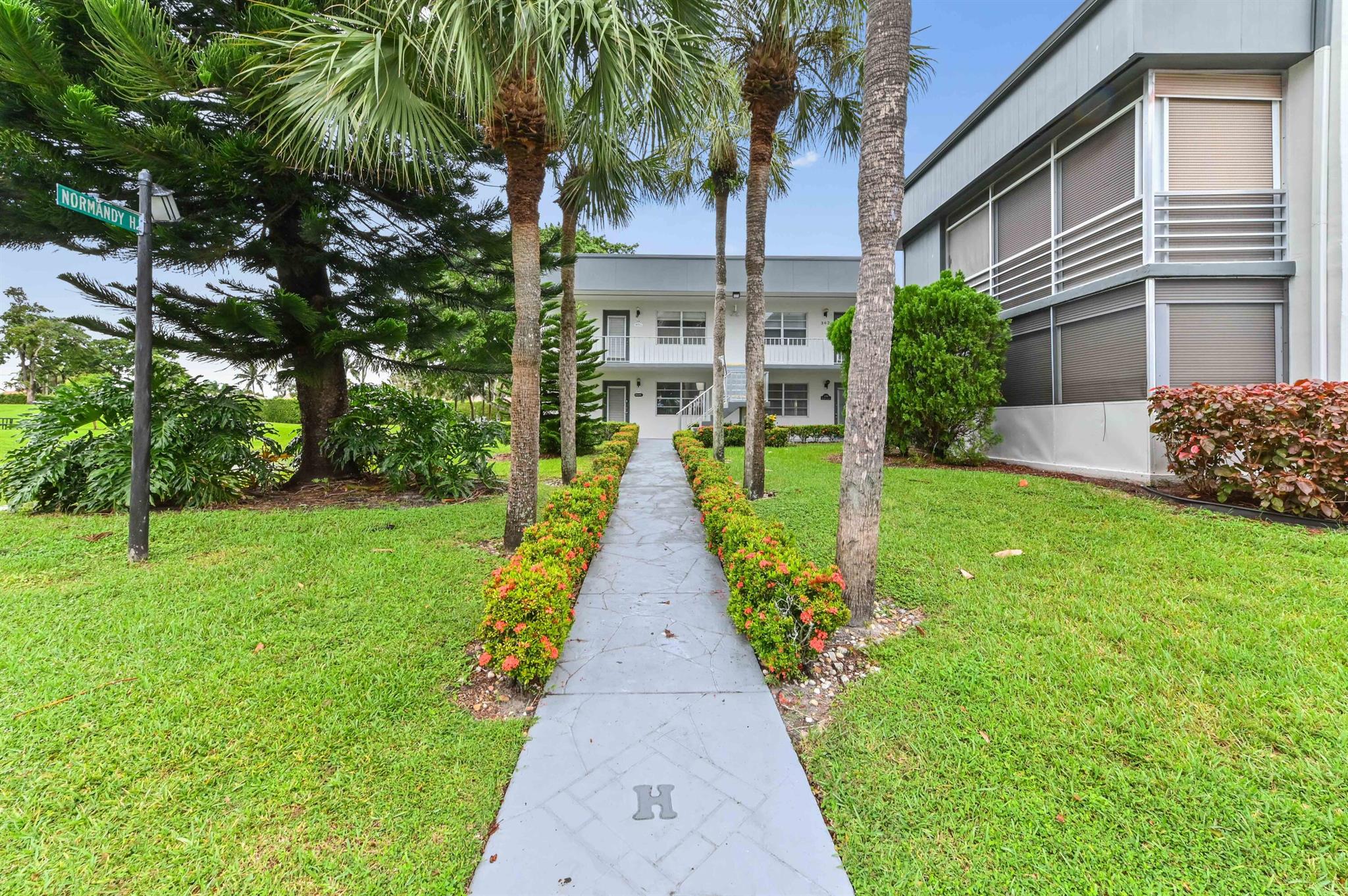 MOTIVATED SELLERWelcome to 338 Normandy Lane - the epitome of elegance combined with convenience. Spoiling you with stunning views, privacy, and comfort, this property is more than just a place to live; it's a lifestyle.What greets you initially is the ground-floor unit, meticulously renovated to provide the latest in modern conveniences. Each element of the whole is perfectly woven together to provide an experience of luxury. With the entire space completely updated, it bears the mark of careful planning and attention to detail.The entrance is nothing short of welcoming, the full ceramic tiles underfoot, and the crown molding overhead set the tone for the remainder of this charming property. A walk through takes you to the masterfully renovated kitchen