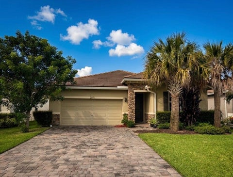Photo of 2071 NW Golden Oak Trail, Jensen Beach, FL 34957 (MLS # B26078069)
