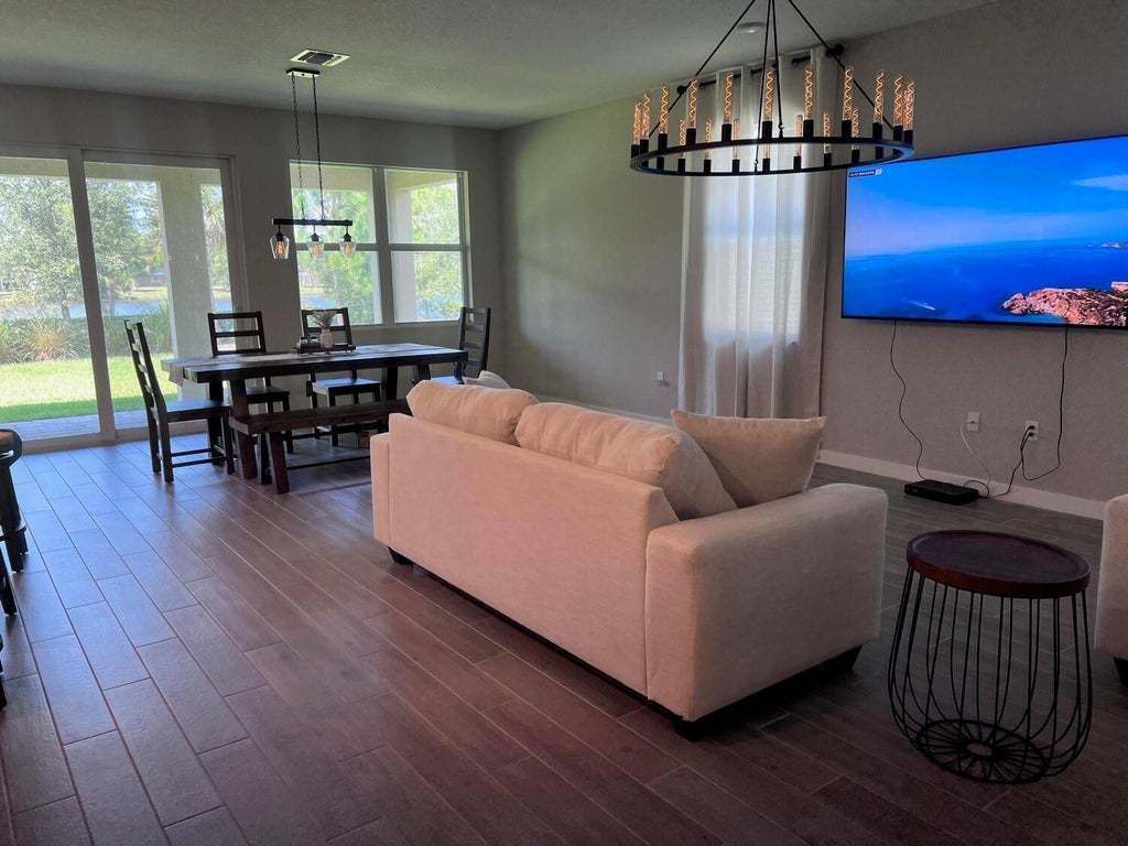 Photo of 2071 NW Golden Oak Trail, Jensen Beach, FL 34957 (MLS # B26078069)