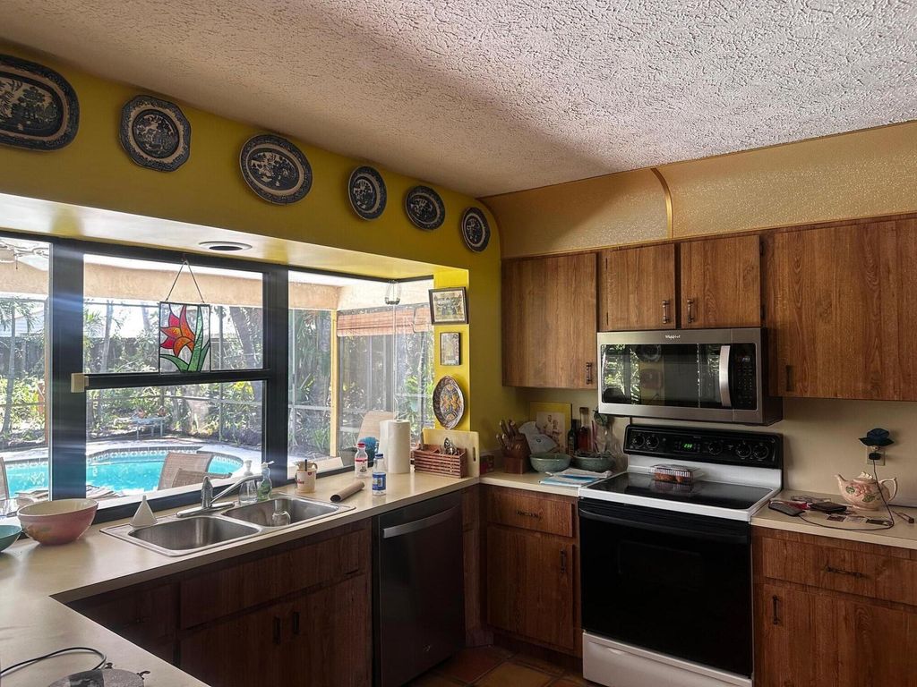 Photo of 782 SE Norcross Avenue, Port Saint Lucie, FL 34983 (MLS # R11096287)