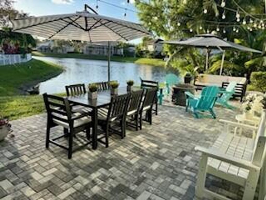 Photo of 265 Swallowtail Lane, Jupiter, FL 33458 (MLS # R11144118)