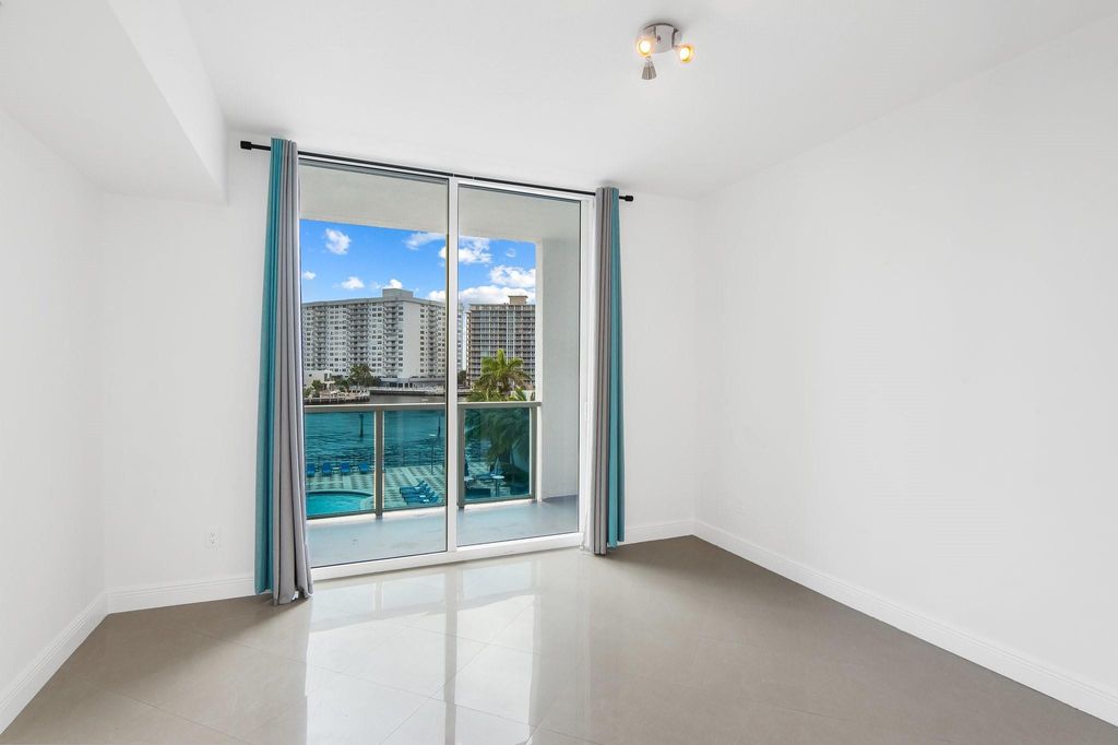 Photo of 1945 S Ocean Drive #307, Hallandale Beach, FL 33009 (MLS # F10549240)