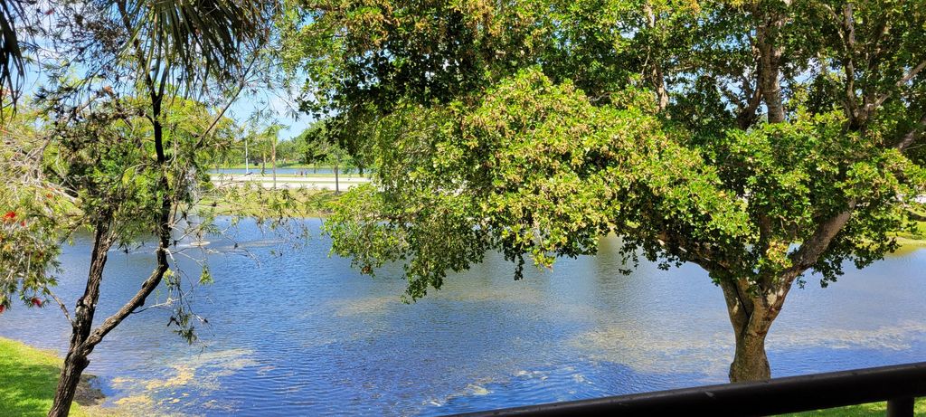 Photo of 611 Lyons Road #8202, Coconut Creek, FL 33063 (MLS # R11159783)