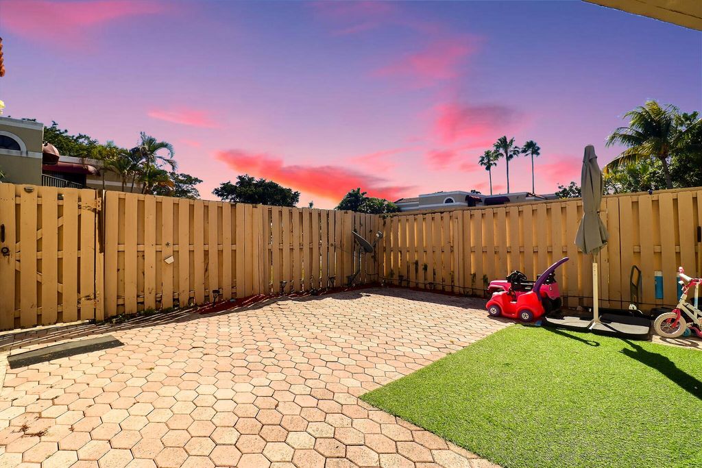 Photo of 3935 Village Drive #C, Delray Beach, FL 33445 (MLS # R11161773)