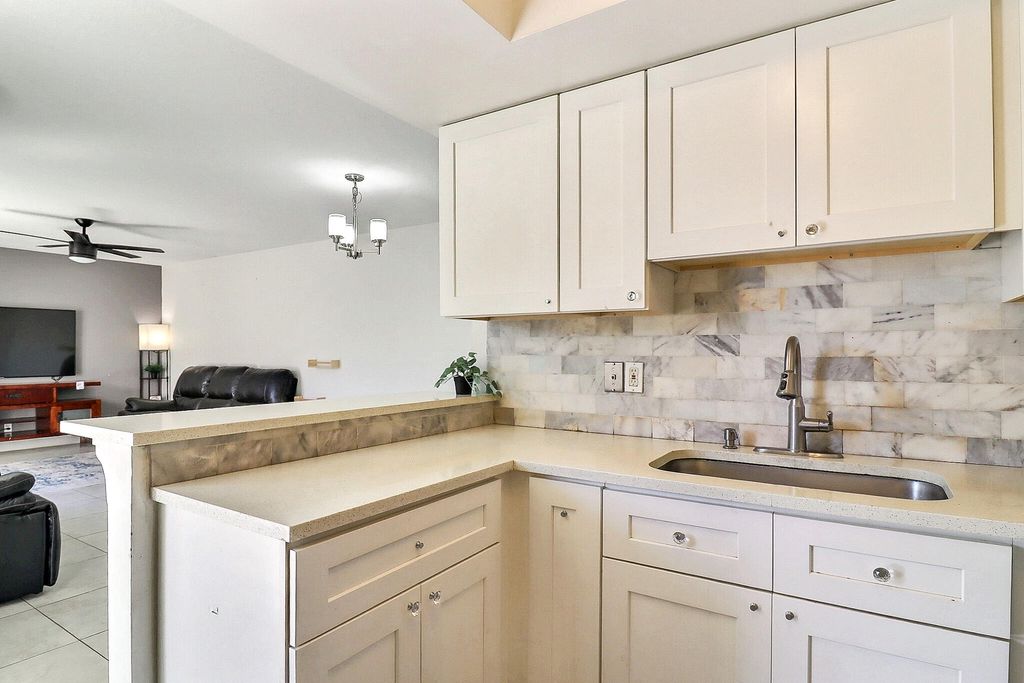 Photo of 3935 Village Drive #C, Delray Beach, FL 33445 (MLS # R11161773)