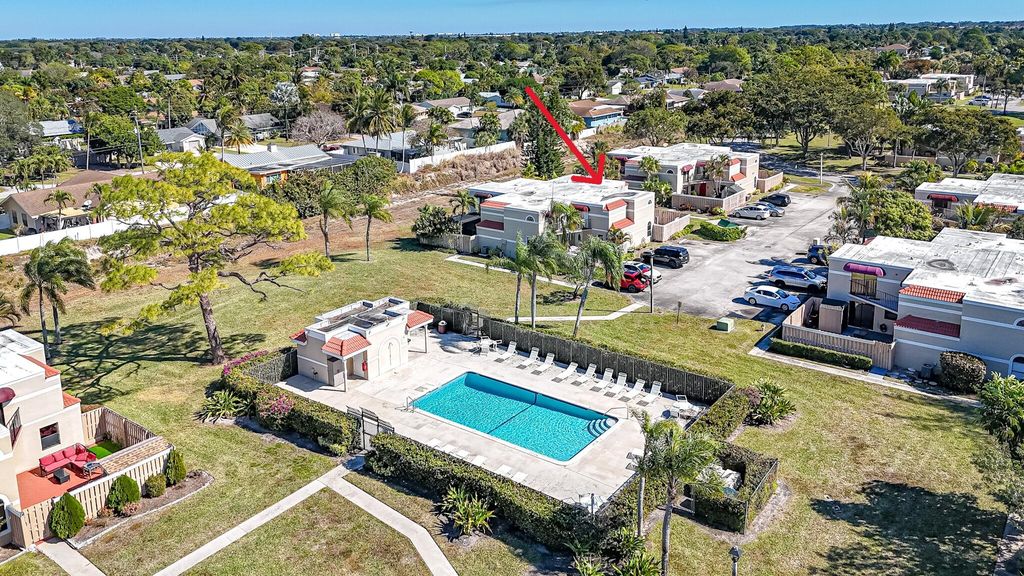 Photo of 3935 Village Drive #C, Delray Beach, FL 33445 (MLS # R11161773)