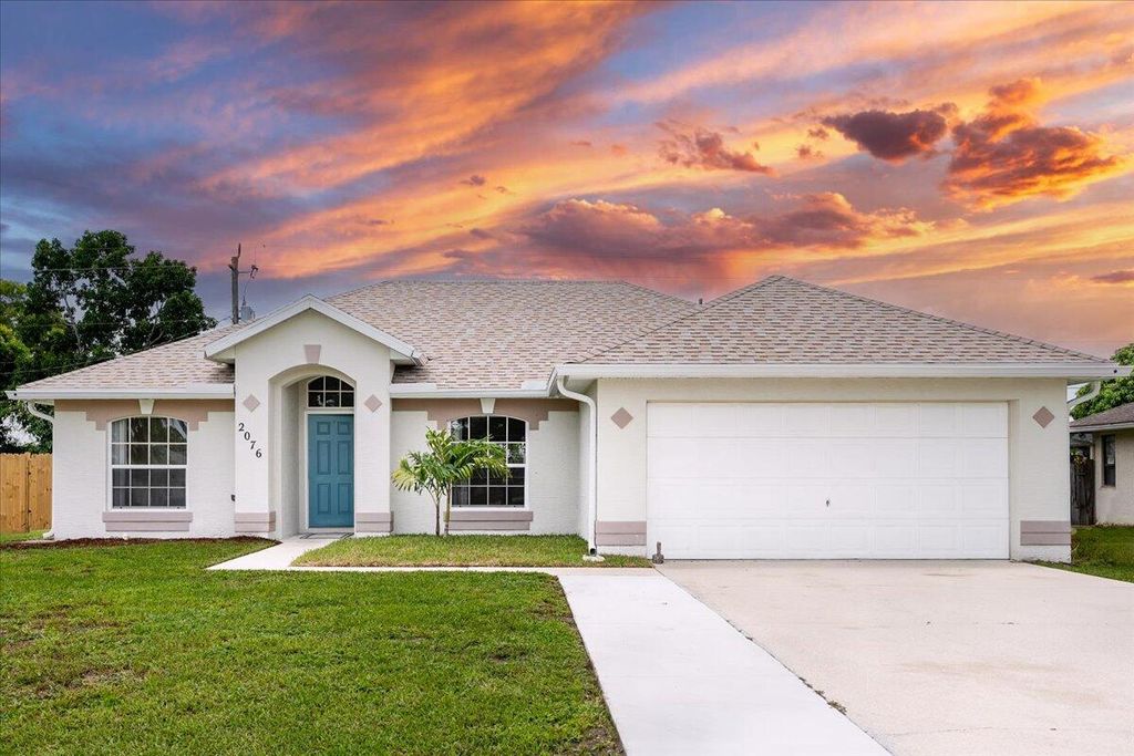 Photo of 2076 SE Camilo Street, Port Saint Lucie, FL 34952 (MLS # R11010653)