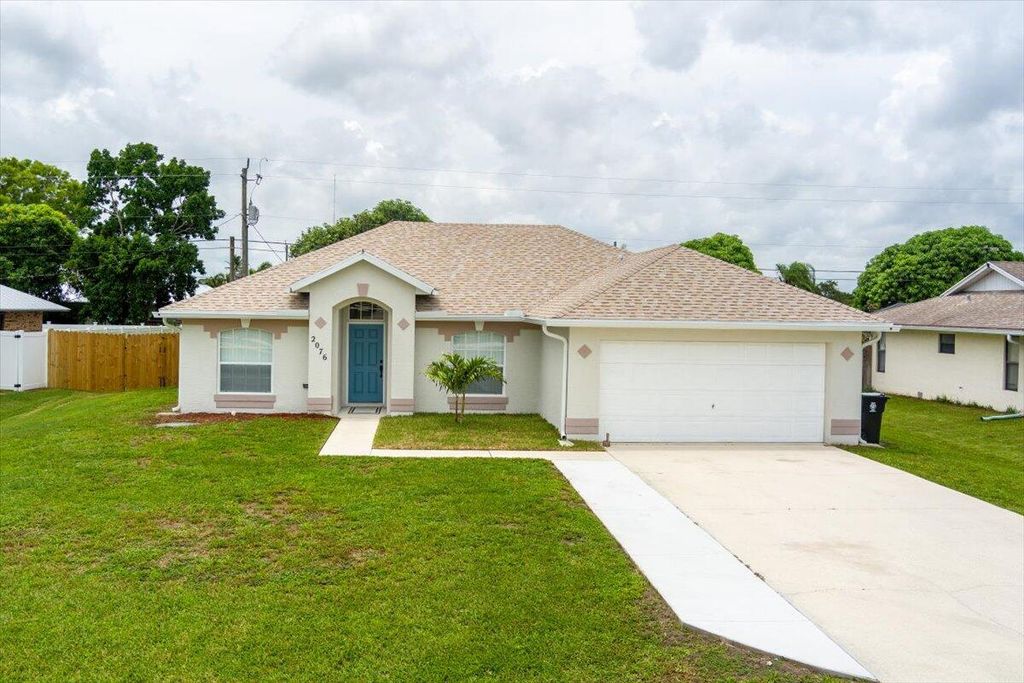 Photo of 2076 SE Camilo Street, Port Saint Lucie, FL 34952 (MLS # R11010653)