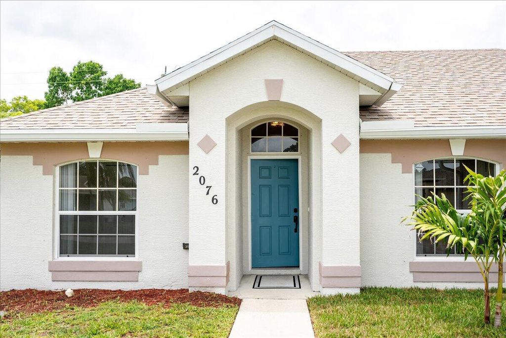 Photo of 2076 SE Camilo Street, Port Saint Lucie, FL 34952 (MLS # R11010653)