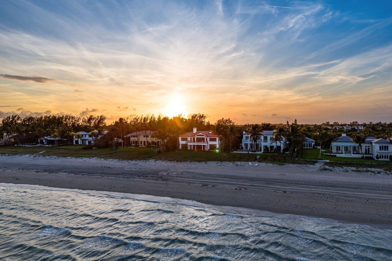The wide stretch of tranquil blue ocean, pristine sandy beaches, lush green landscaping dotted with tropical palm trees are some of the attributes that define 3435 N. Ocean Blvd. Playful yet pragmatic, this superb coastal estate was completed with unsurpassed attention to detail and is sited on 100' of oceanfront in the exclusive town of Gulfstream. Featuring 8,359 TSF, 4 bedrooms, 4.1 bath main house and an attached guest house with a bedroom and bathroom. Upon entering, guests and family are greeted with wide-open spaces creating a balanced composition of expansive ocean views blended with floor to ceiling glass infusing the interior with abundant natural light.