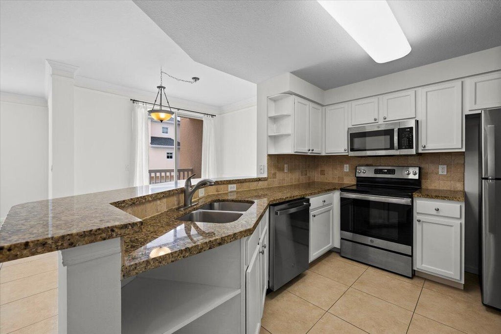 Photo of 155 GALICIA Way #210, Jupiter, FL 33458 (MLS # B26070765)