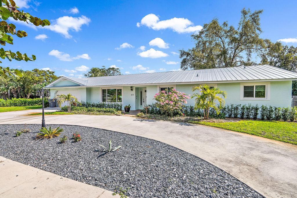 Photo of 615 3rd Street, Lake Park, FL 33403 (MLS # R10869135)