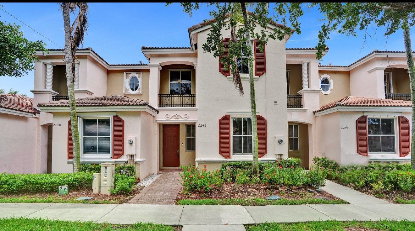 Motivated Seller! Welcome to Marbella Cove, a gated enclave within the desirable Waterstone community. This spacious 4BR/3BA townhome features rich espresso wide plank flooring-low maintenance,modern luxury, butcher block kitchen counters, volume ceilings, and a private fenced backyard with storage. Enjoy resort-style amenities including multiple community pools, clubhouse, gym, playground, and 24/7 security. Prime location near highways, hospitals, dining, and shops. LOW HOA. A perfect blend of comfort, style, and convenience.