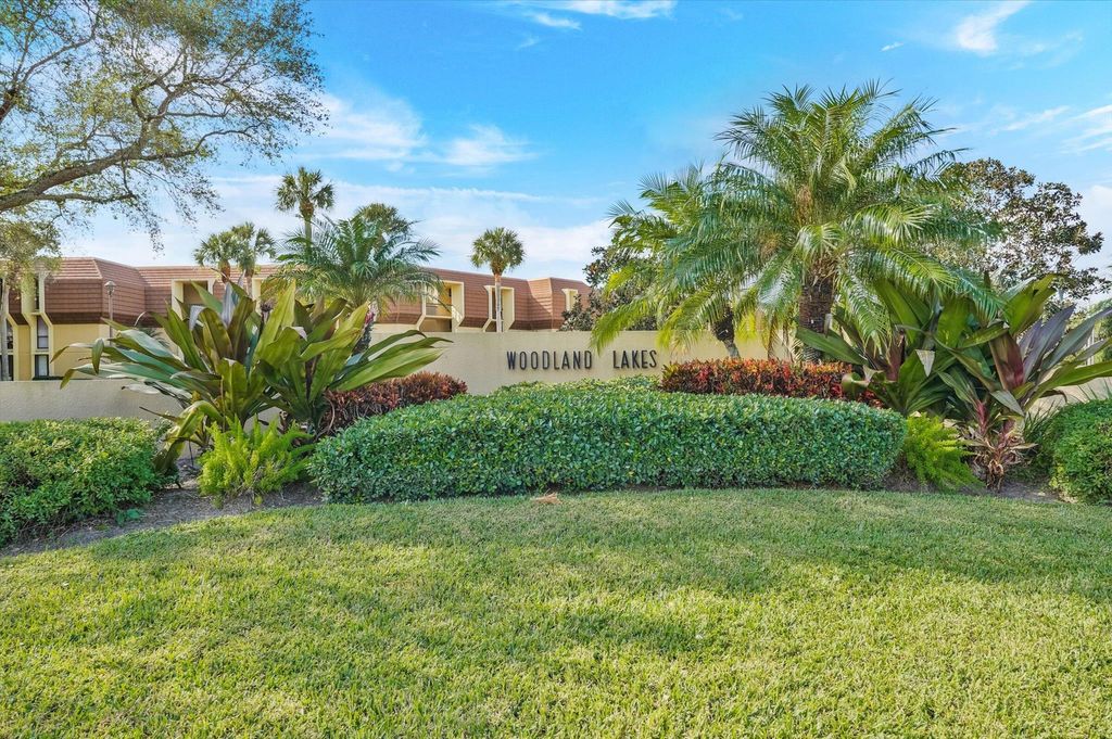 Photo of 5344 Woodland Lakes Drive #122, Palm Beach Gardens, FL 33418 (MLS # R11149082)