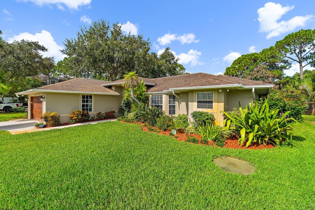 Photo of 4120 SW BELSHAW Street, Port Saint Lucie, FL 34953 (MLS # B26069290)
