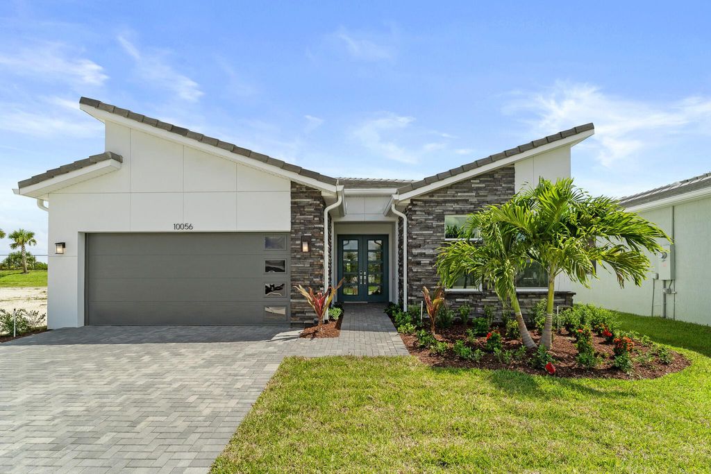 Photo of 10056 SW Carnelian Street, Port Saint Lucie, FL 34987 (MLS # R11128927)