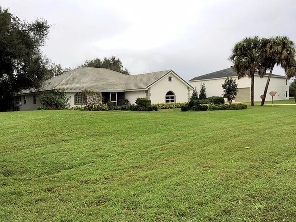 Photo of 18502 Tranquility Base Lane, Port Saint Lucie, FL 34987 (MLS # R10697630)