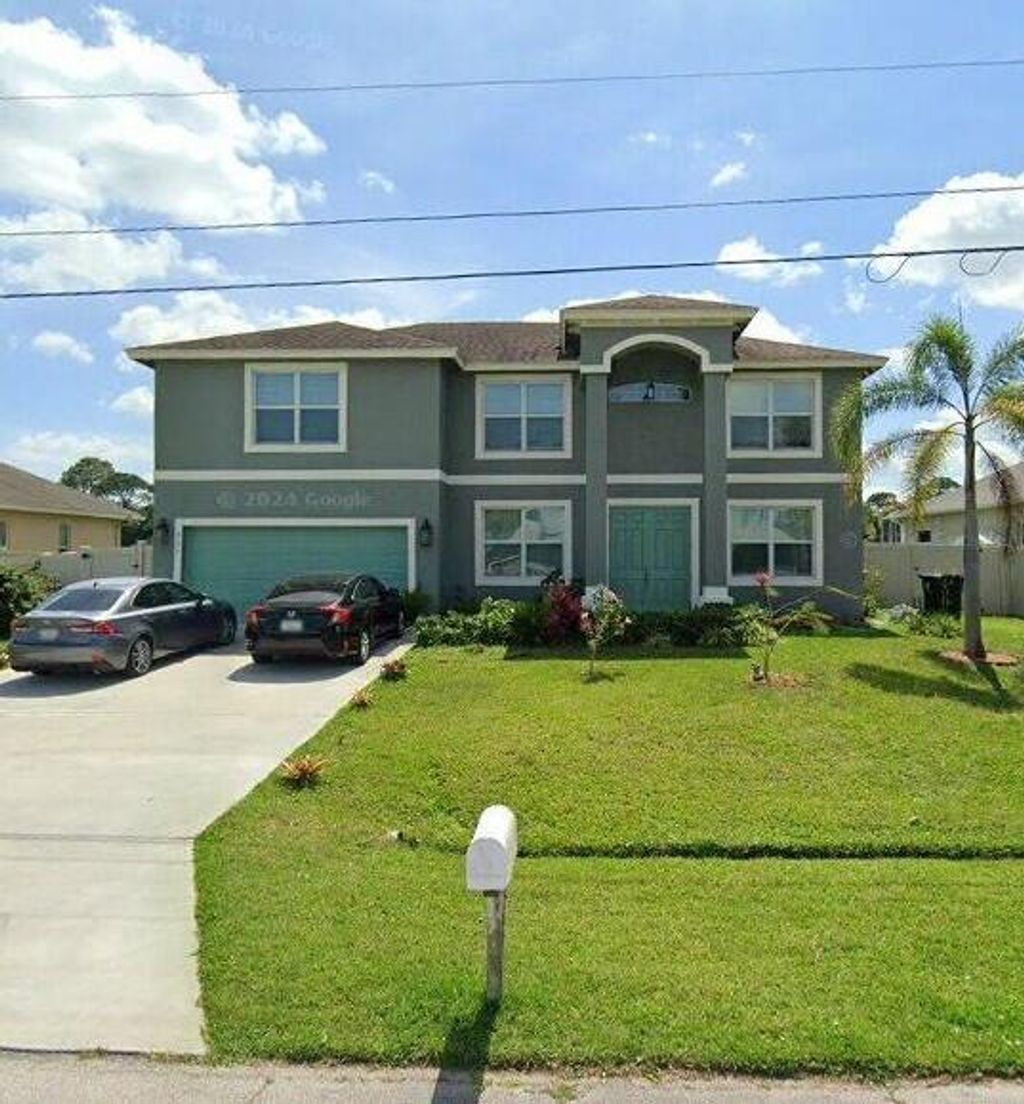 Photo of 902 SW Abbot Avenue, Port Saint Lucie, FL 34953 (MLS # B26014291)