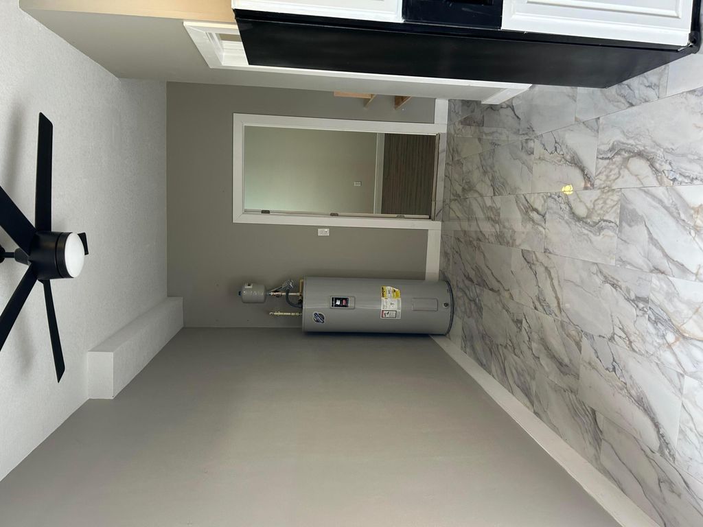 Photo of 902 SW Abbot Avenue, Port Saint Lucie, FL 34953 (MLS # B26014291)