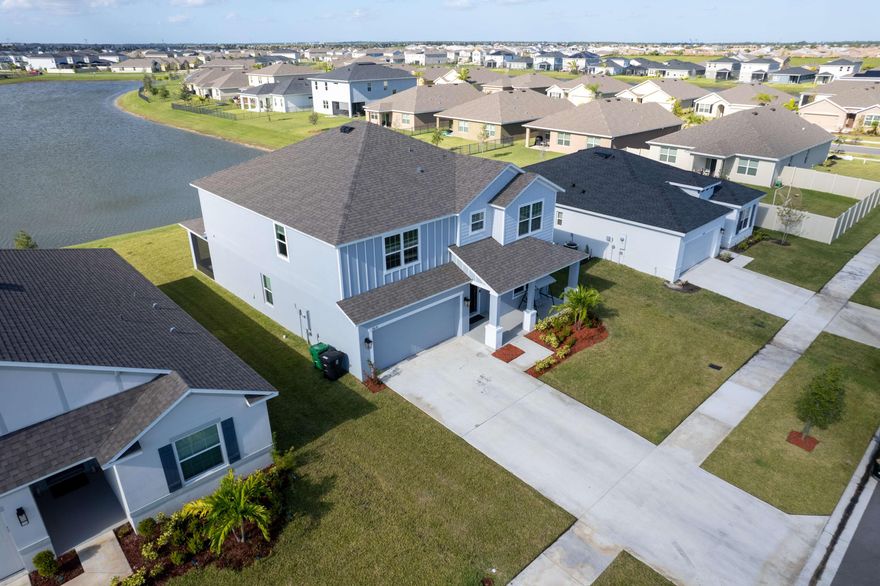 Built in 2023, this stunning waterfront home offers modern design, spacious living, and the peace of mind that comes with newer CBS (concrete block) construction. Featuring 5 large bedrooms and 3.5 bathrooms, this beautifully designed residence provides 3,230 sq. ft. under air and 3,679 total sq. ft., giving plenty of space for family living and entertaining.
The open and functional floor plan showcases expansive living areas, abundant natural light, and generously sized bedrooms throughout. Step outside and enjoy gorgeous water views, creating the perfect backdrop for relaxing mornings or peaceful evenings. Located within a newer community called ''Crosstown Commons'' with very low and affordable HOA fees, residents enjoy well-maintained amenities and a welcoming neighborhood. Approx Mea Convenience is key--this home is only 5 minutes from the I-95 entrance, making commuting quick and easy while still enjoying the tranquility of a newer residential development.

Experience the best of the Treasure Coast lifestyle, with beautiful beaches, Intracoastal waterways, boat ramps, and waterfront dining all within 25-30 minutes.

A rare opportunity to own a spacious, nearly new waterfront home in one of Port St. Lucie's fastest-growing areas. Schedule your private showing today.