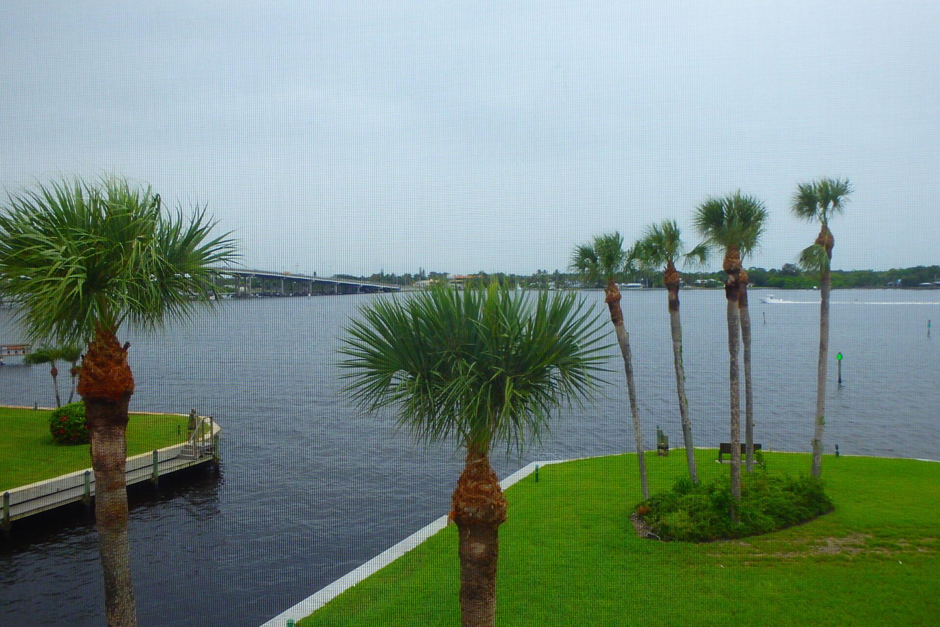 MAGNIFICENT WIDE RIVER VIEWS! This unique penthouse corner unit gazes at million dollar water views, stunning sunsets & Florida's travelling mega yachts. High end kitchen appliances, full impact windows with rare triple impact slider to quartz floored screened balcony, designer paint colors, beautifully remodeled bathrooms & elevator to your piece of paradise. Circle Bay offers slips available for up to a 36' boat at an amazingly low rate of $1.50 a ft./per mo. plus on-site office, covered parking, clubhouse, pool, changing rooms with showers, fully equipped gym, picnic area with grills and eating area, fire pit, workshop, sauna, hot tub, and fully equipped workshop. Minutes by car or boat to quaint downtown Stuart, shopping & beautiful Treasure Coast beaches. Truly a boater's PARADISE